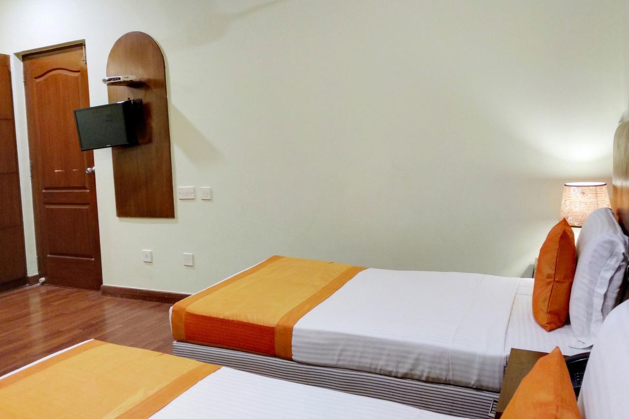Oyo 6110 Thalassa Suites バンガロール エクステリア 写真